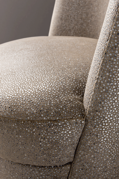 Ava armchair with Moka Oak base and covered in custom fabric