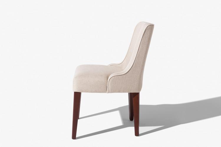 Isabey chair with Brown lacquered legs and covered in fabric