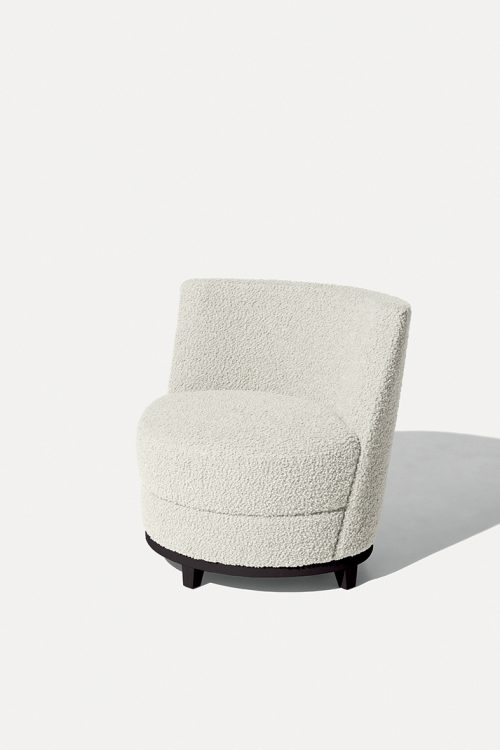 Ava armchair with Moka Oak base and covered in fabric