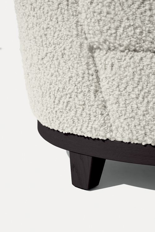 Ava armchair with Moka Oak base and covered in fabric