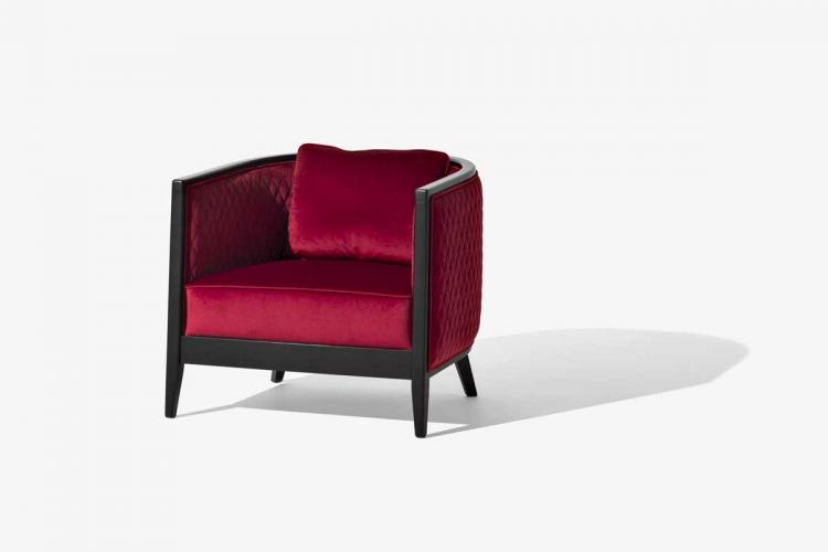 Saten armchair with Black finish structure and covered in velvet