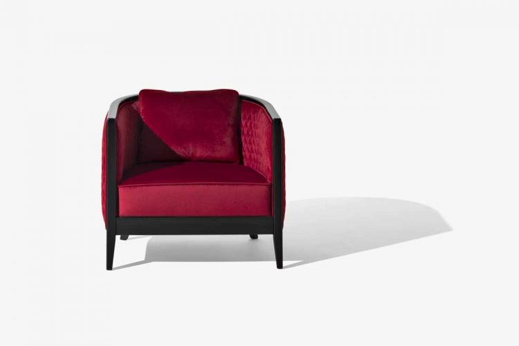 Saten armchair with Black finish structure and covered in velvet