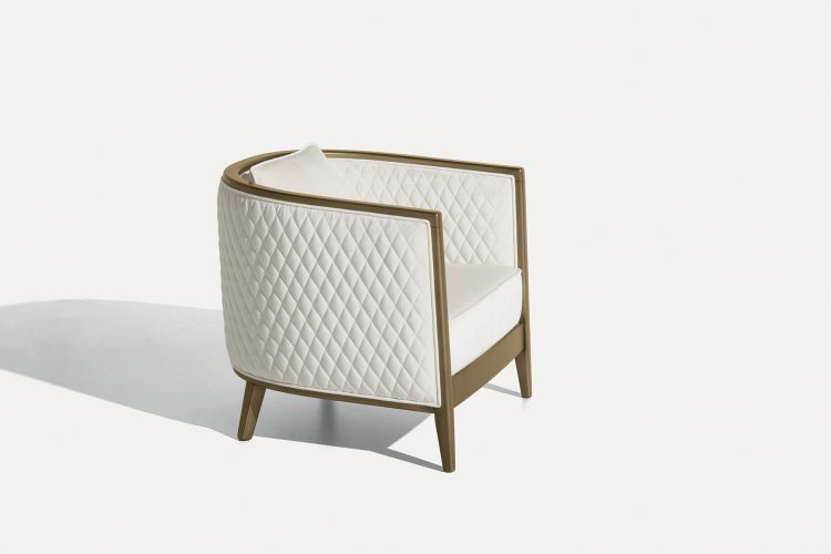 Saten armchair with bronze lacquered finish structure and covered in velvet