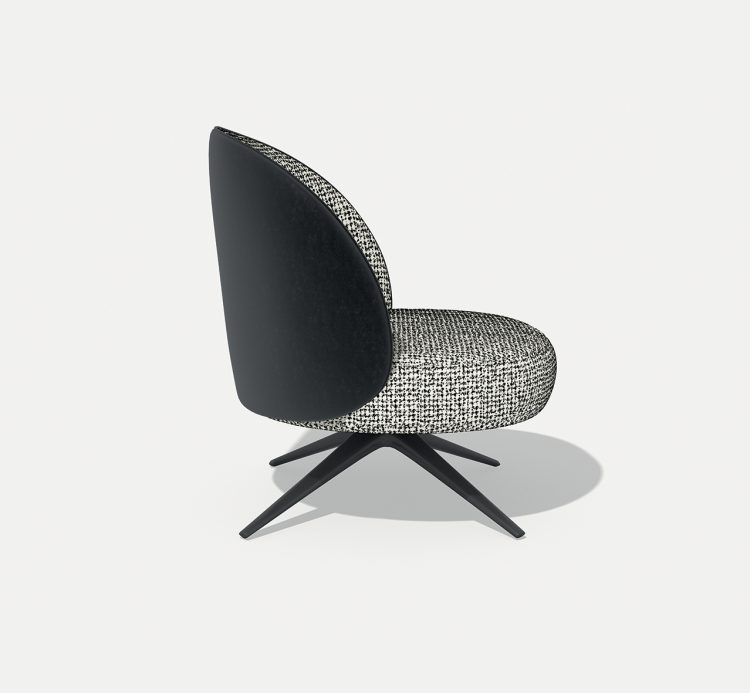 Sophie swivel armchair covered in fabric and leather