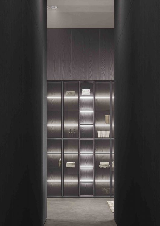 Alu tall unit with integrated LED lighting behind the shelves