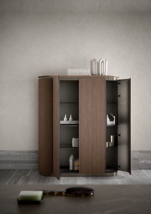 Freestanding oval cabinet in ribbed Walnut finish/Black Nickel