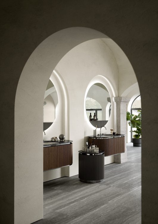 Nàos vanity unit in ribbed Walnut finish/Chrome. Top in Nero Marquinia marble